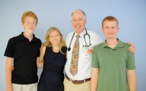 (Dr.William Selvidge beside his wife, Jennifer and sons, Shafe (far left) and Lucas (far right).
