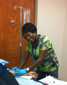 Jennifer Bradsher, RN hard at work with patient care at Charles Drew CHC.
